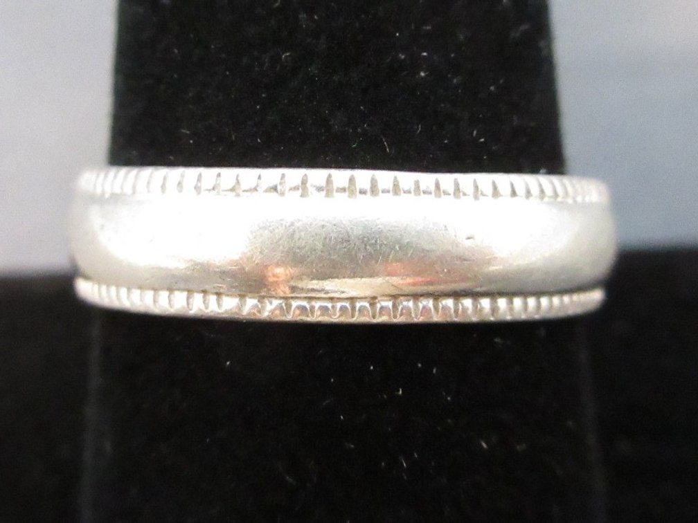 Marked .925 sterling wedding band