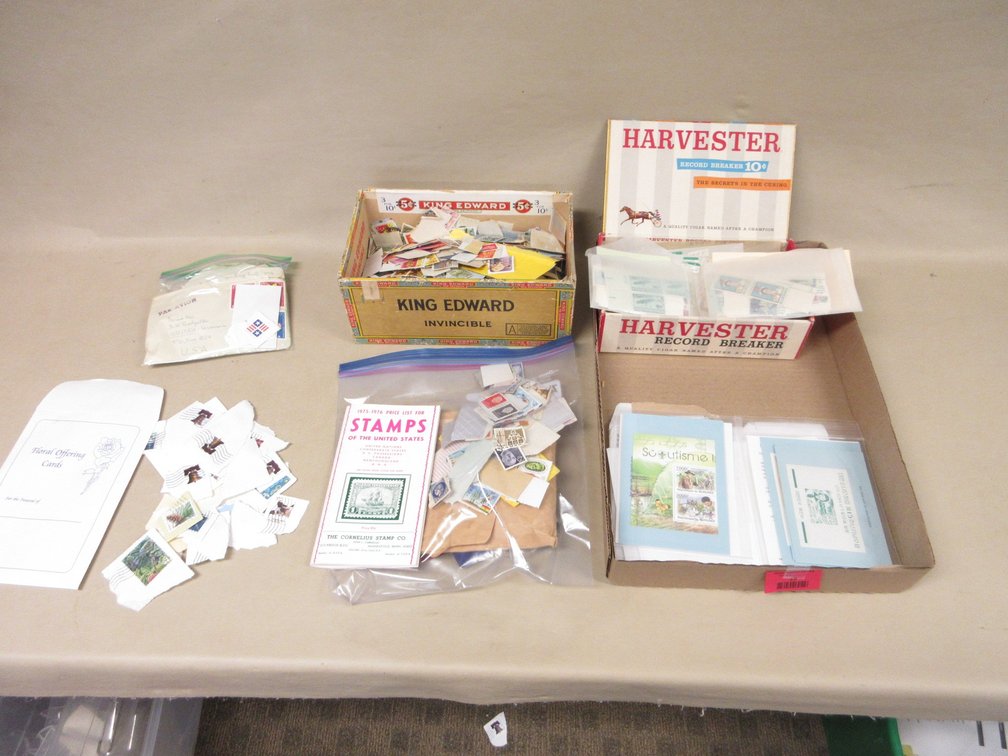 Flat of collected postage stamps