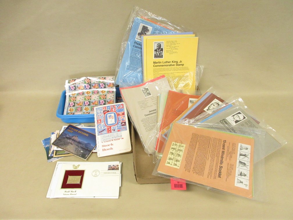 Flat of collected postage stamps