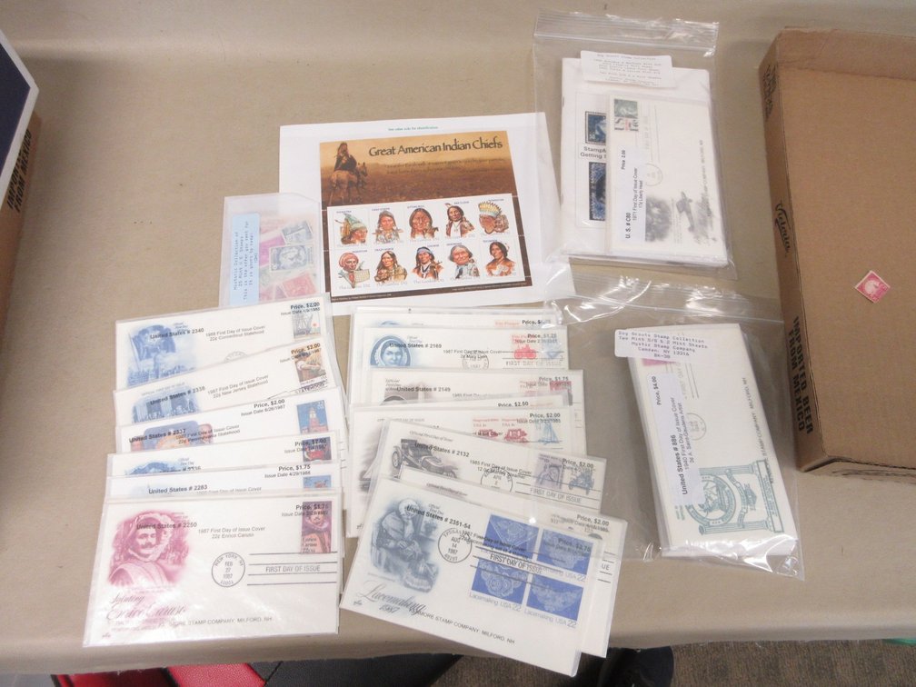 Flat of collected postage stamps