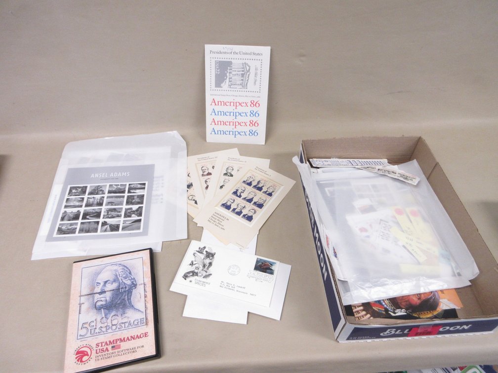 Flat of collected postage stamps