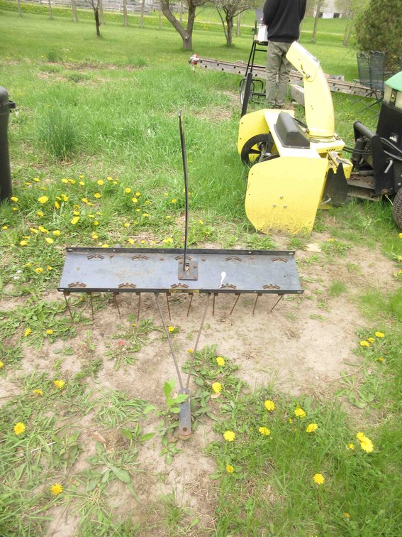 Agri-Fab pull type spring tooth thatcher