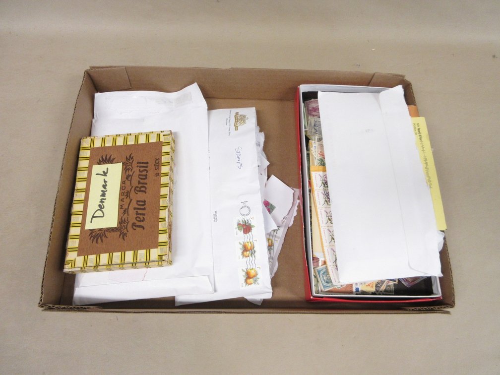 Flat of collected postage stamps