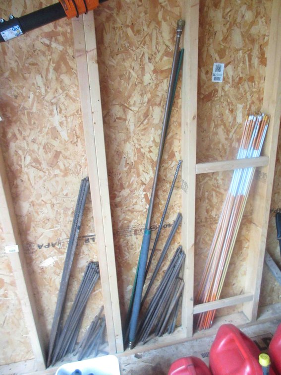 Group of rebar and driveway markers
