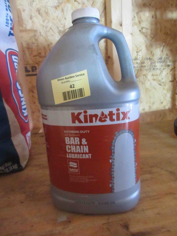 Jug of Kinetix bar and chain oil