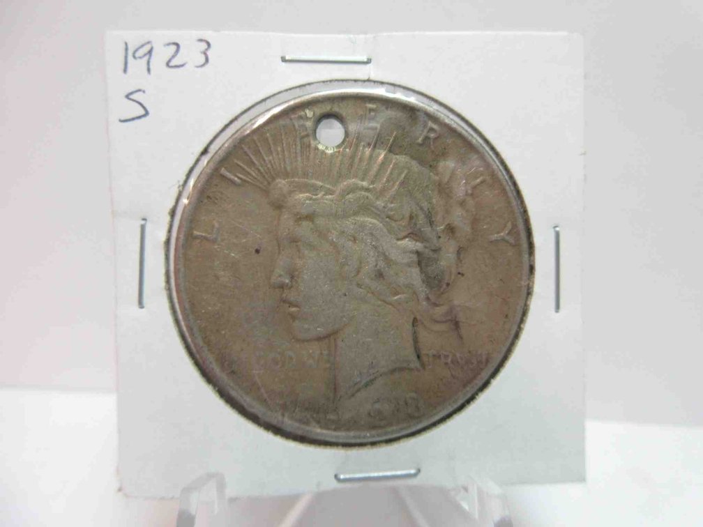 1923-S Peace dollar (has hole)