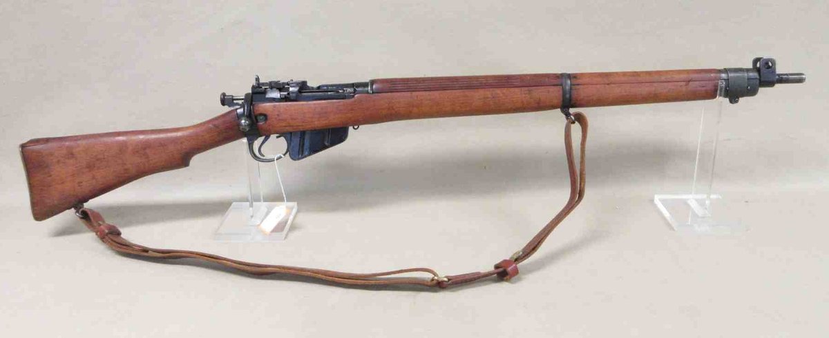 Enfield SMLE No. 4 .303caliber bolt action rifle (subject to transfer fee)