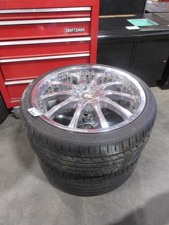 (2) BMW tires on chrome rims