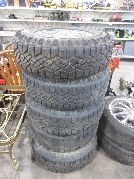 (5) Good Year Wrangler Duratrac tires on Jeep rims