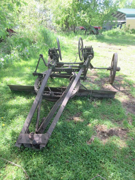 Antique steel wheel grader