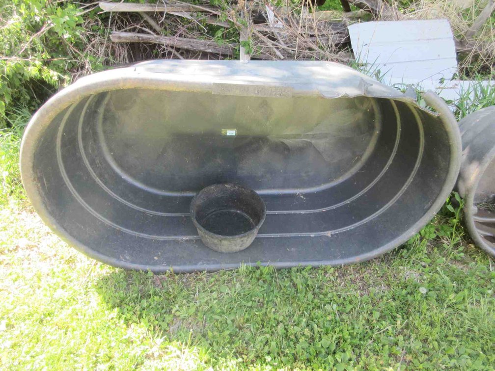 Fleet Farm poly stock tank with rubber feeder pail