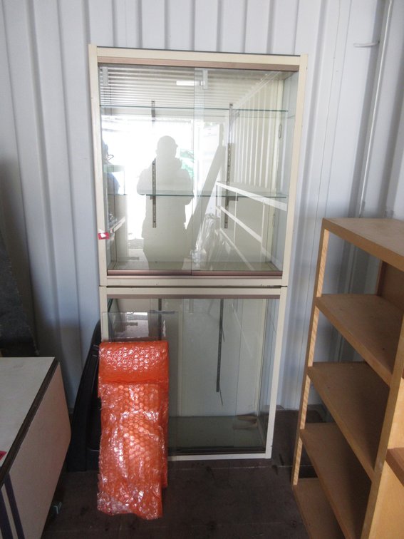 (2) Steel display cases with glass doors and shelves