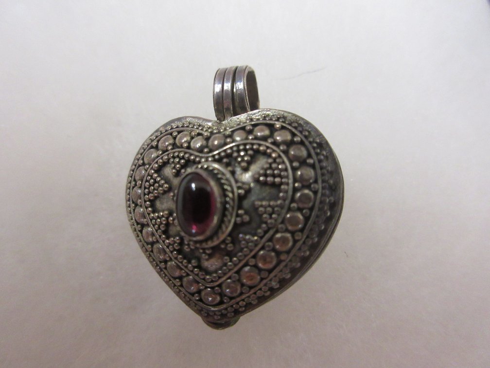 .925 Sterling with amethyst stone heart locket
