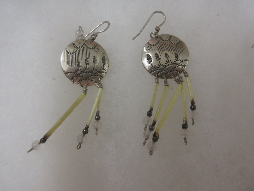 Marked "A A" sterling" quill pierced earrings