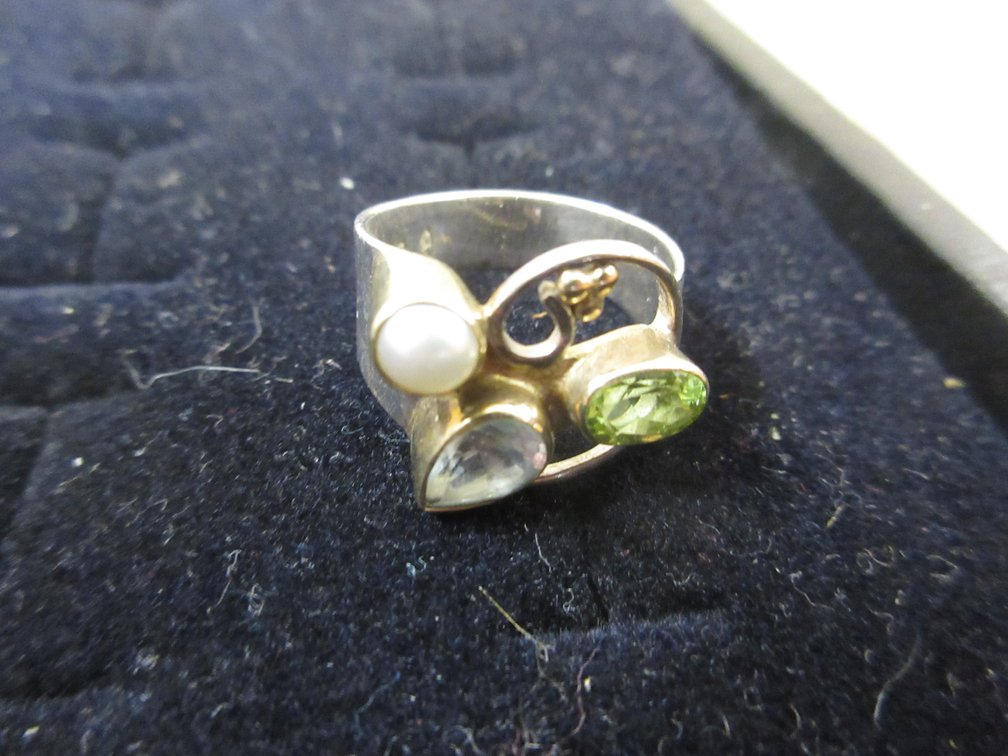 .925 Sterling ring with peridot, pearl, and topaz stones