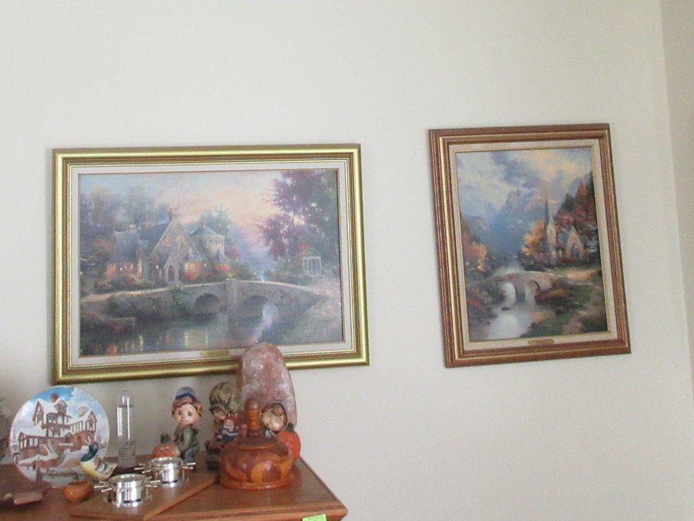 (2) Thomas Kinkade prints on board in frames