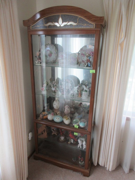 Lighted curio cabinet with side doors (remove after 2pm)
