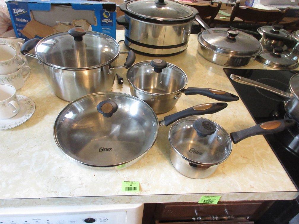 Set of Oster copper bottom pots and pans