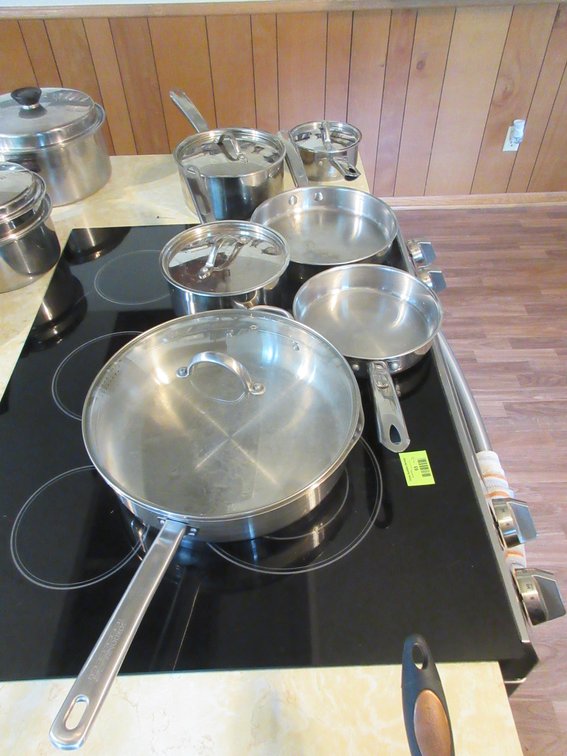 Group of stainless pots and pans