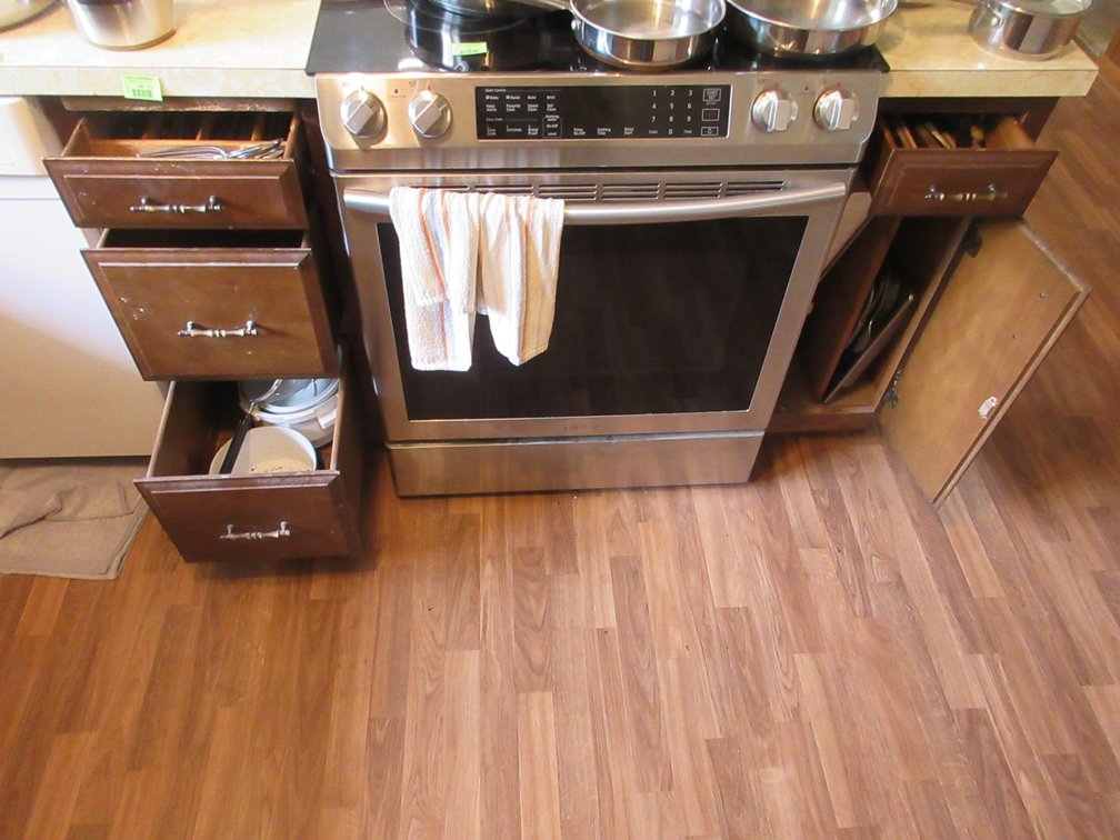 Contents of drawer and lower cabinet