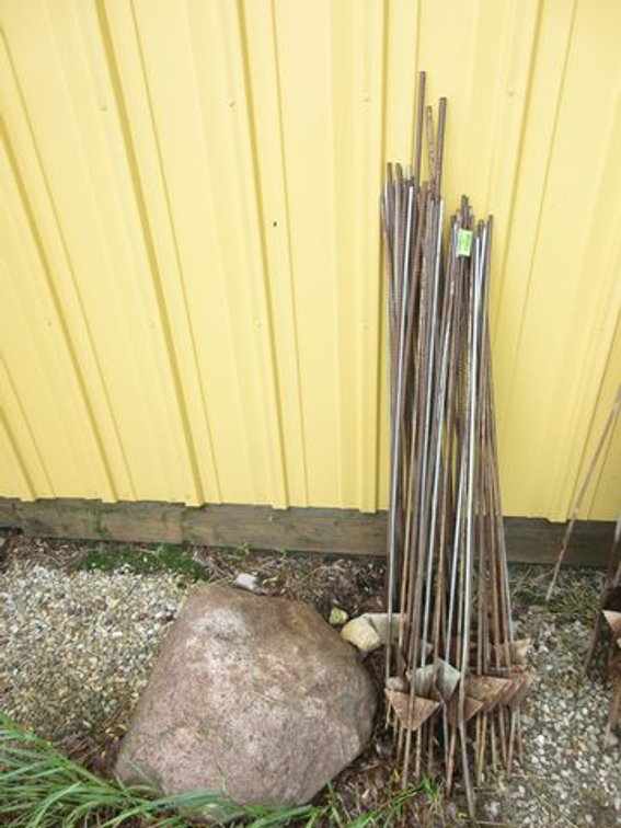 Group of metal electric fence posts