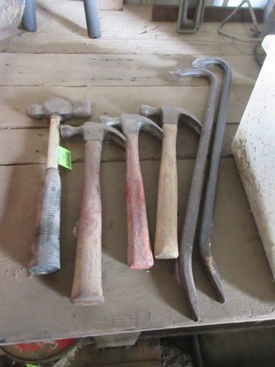 Group of pry bars and hammers
