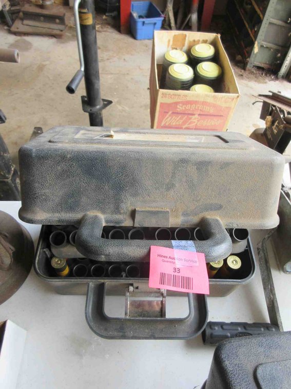 Shotgun shell case with some shells