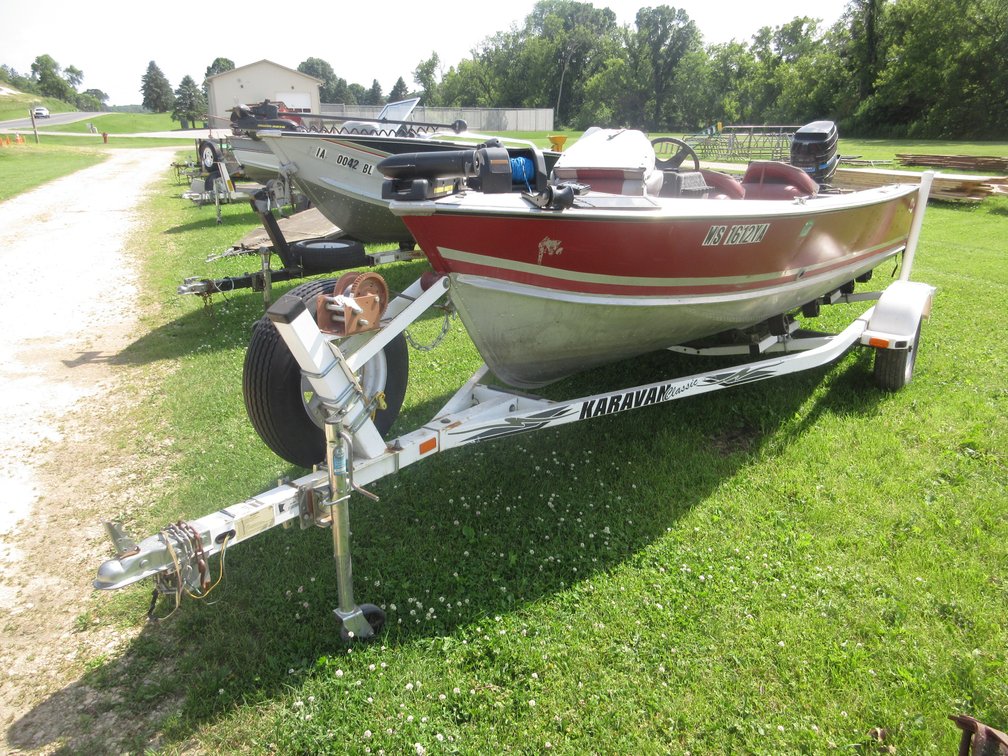 Lund aluminum 16'L fishing boat on Karavan Classic trailer