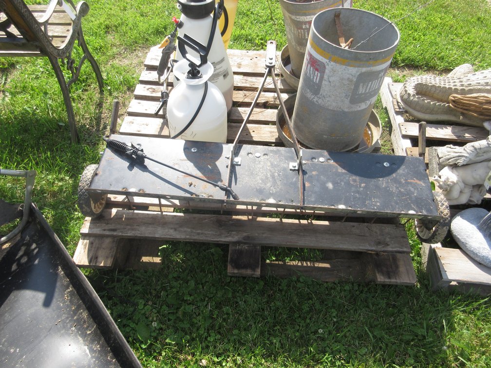 Garden pull behind drag