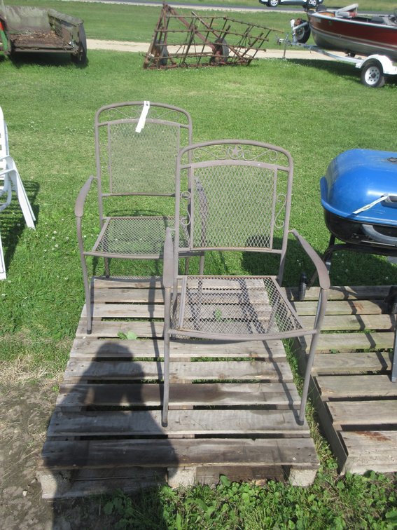 (2) Wrought iron patio chairs with STAR design