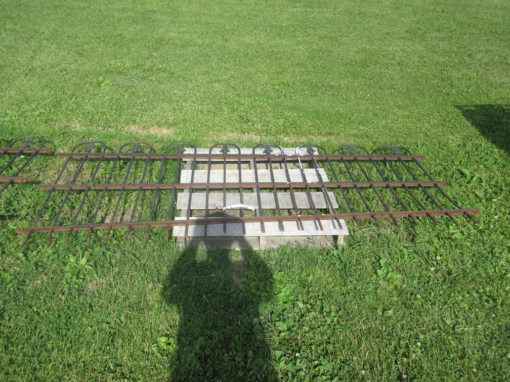 Cast metal decorative fence section