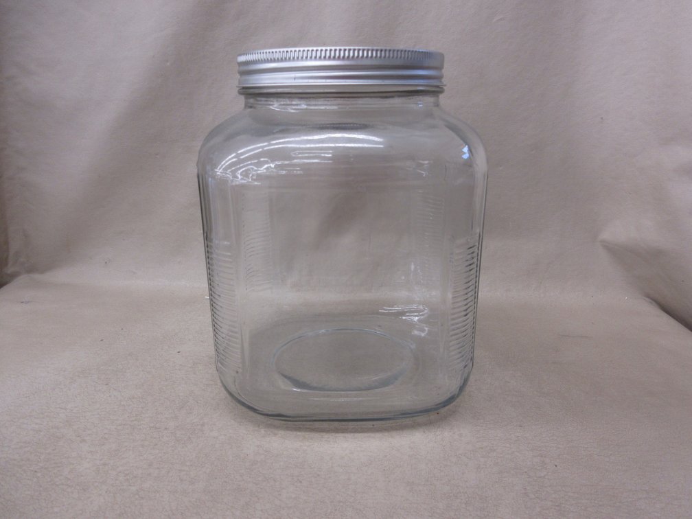 Clear glass square Hoosier jar with metal lid