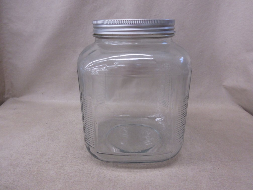 Clear glass square Hoosier jar with metal lid