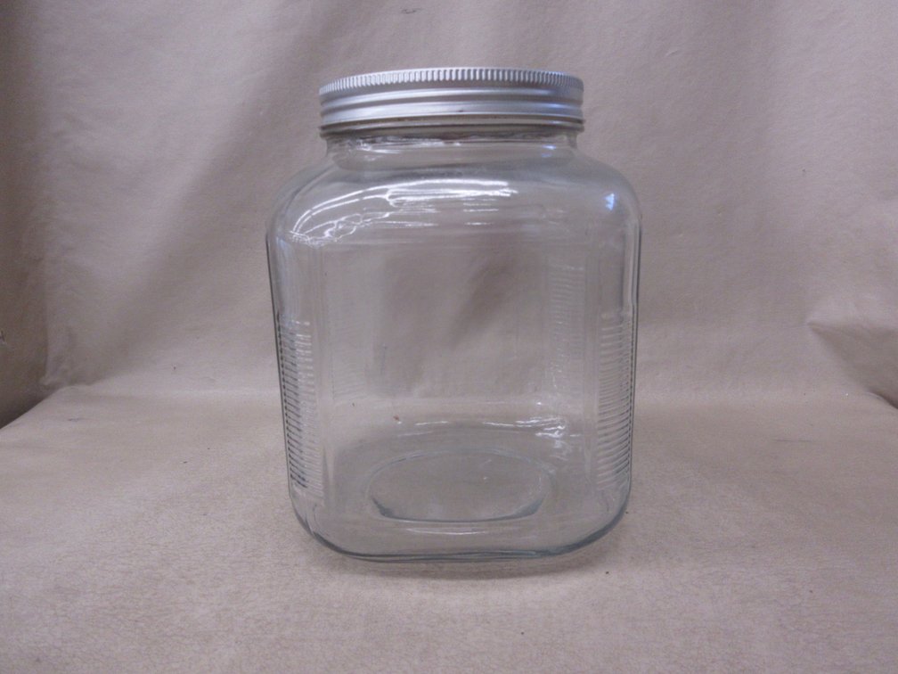 Clear glass square Hoosier jar with metal lid