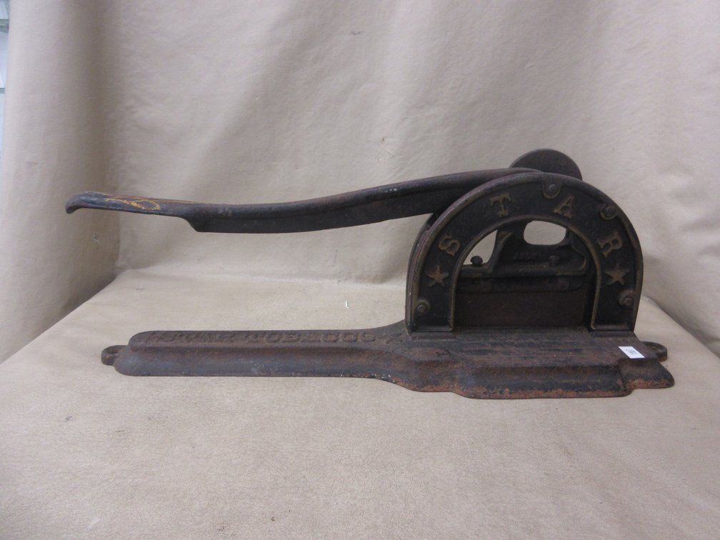 Star Tobacco cast iron tobacco cutter