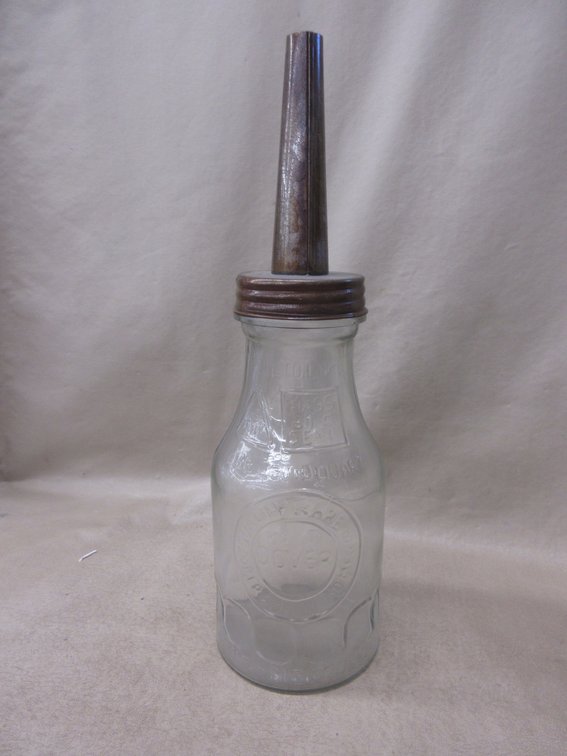 Embossed Socony Motor Oil quart bottle with metal spout