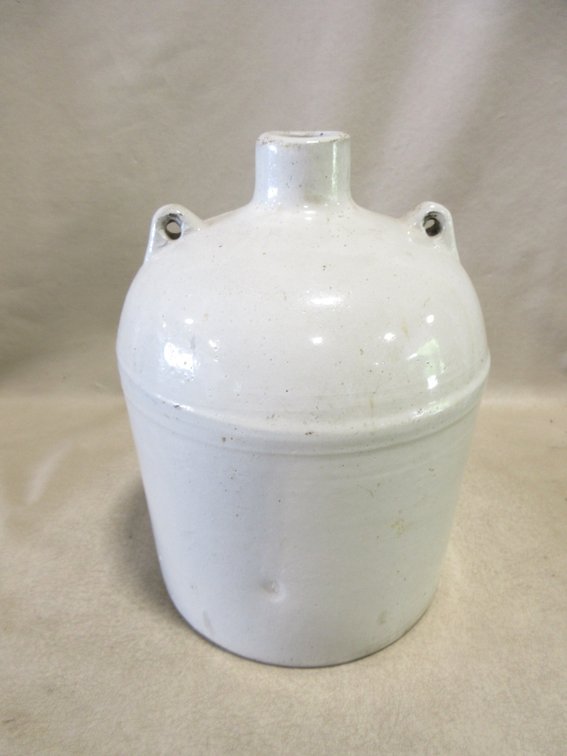 Unmarked stoneware whiskey jug