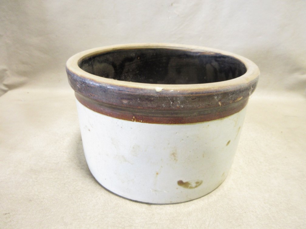 Unmarked crock with Albany slip band