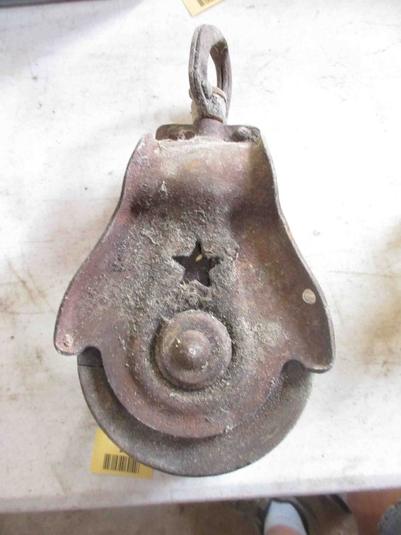 Antique steel and wood pulley