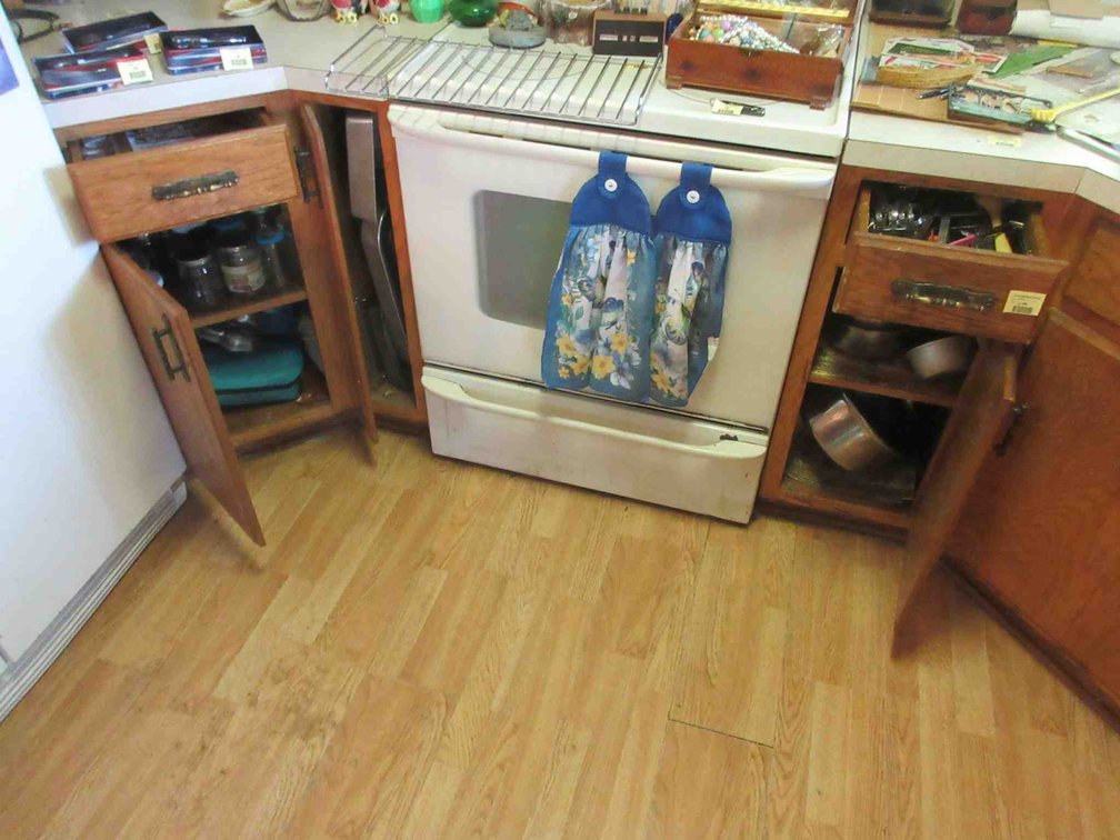 Contents of (2) lower drawers and (3) cabinets