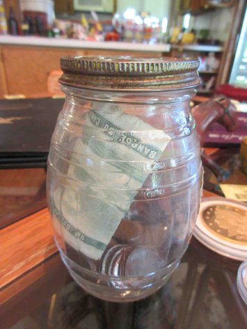 Image for Jar of coins and currency