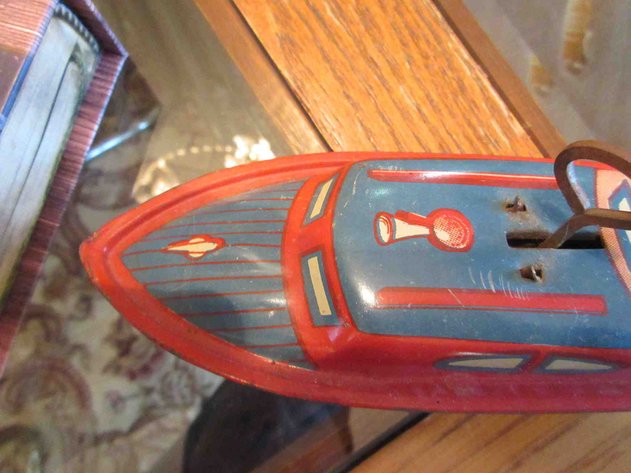Image for Lindstrom tin litho wind up boat
