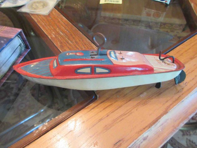 Image for Lindstrom tin litho wind up boat