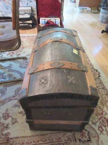 Image for Antique metal and wood dome top trunk with contents