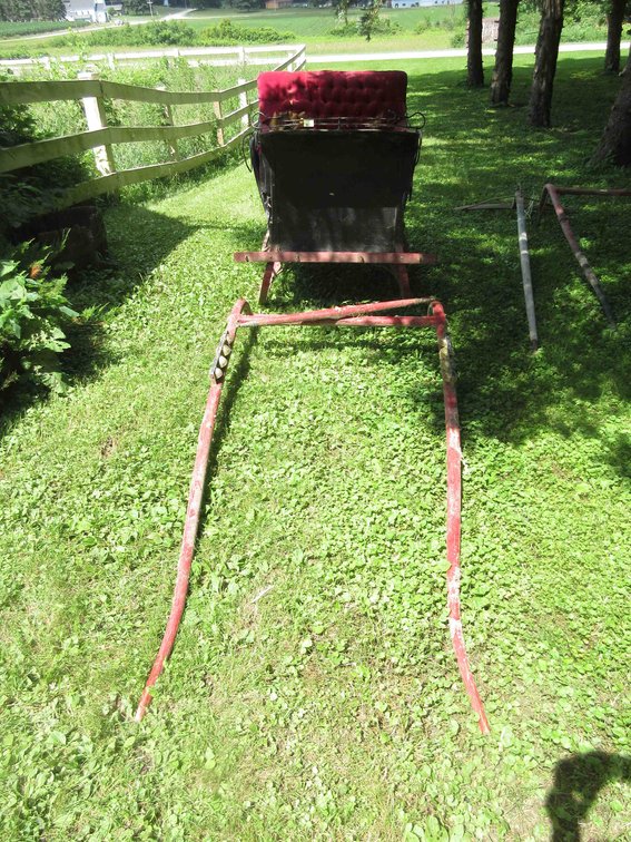 Antique cutter sleigh with single horse pole and bells