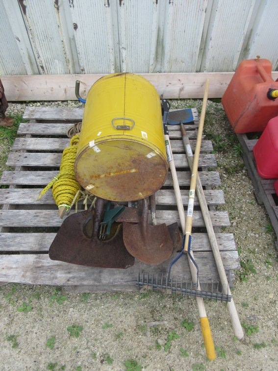 Group of yard tools on pallet