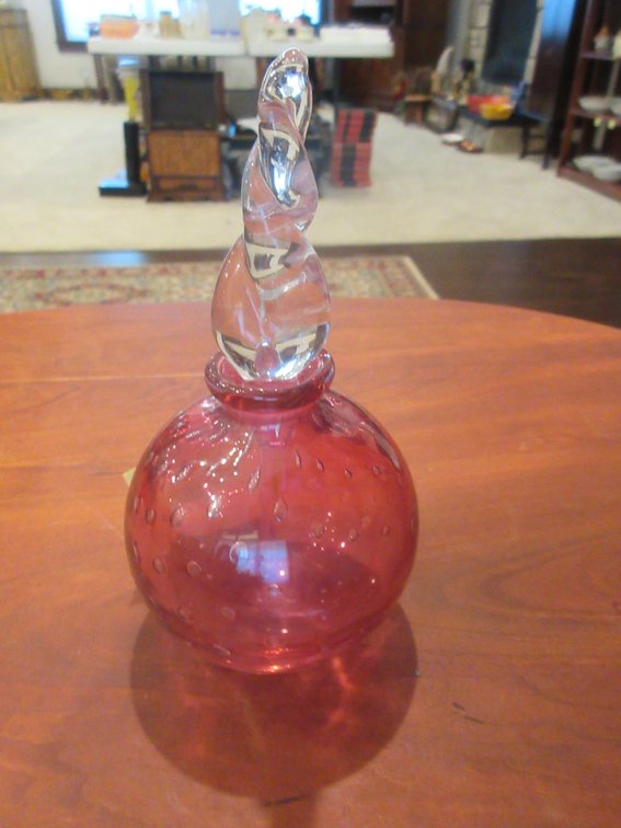 Cranberry perfume with stoper