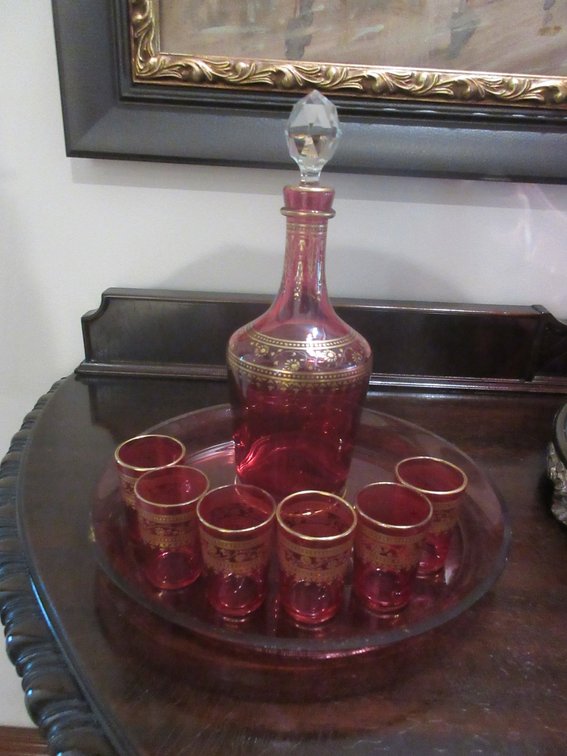 Cranberry decanter set with gold detail