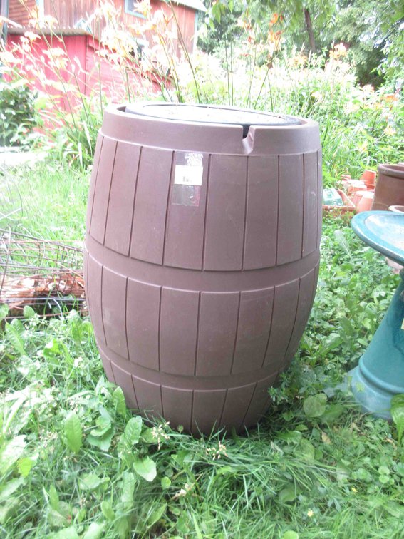 Plastic rain barrel