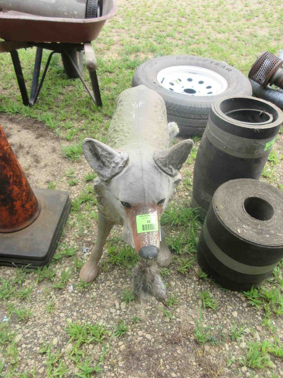 Plastic coyote statue